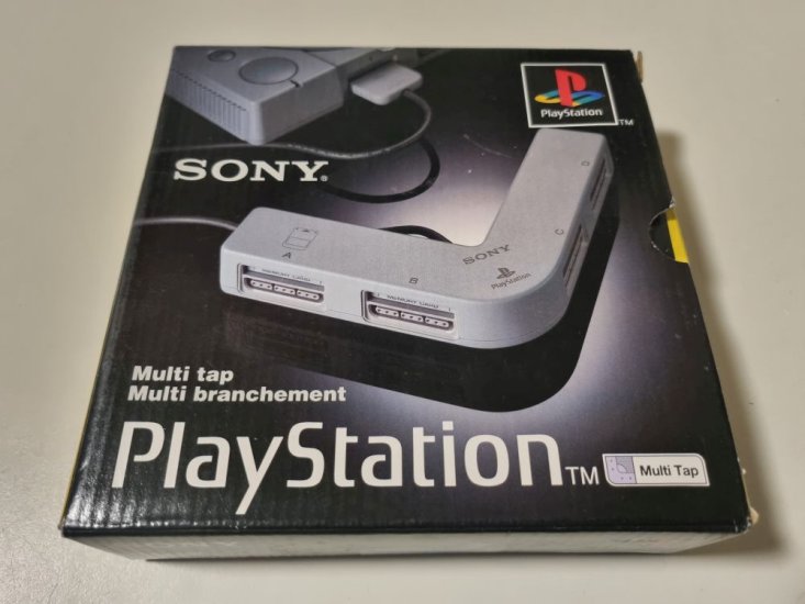 (Bild für) PS1 Multi Tap - zum Schließen ins Bild klicken