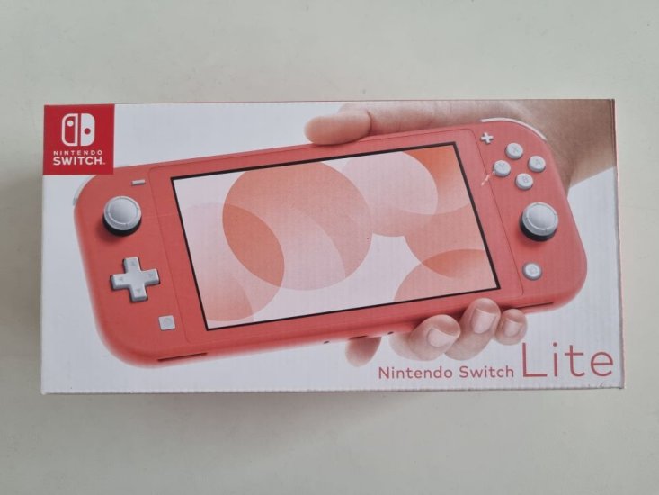 (Bild für) Switch Lite Coral - zum Schließen ins Bild klicken