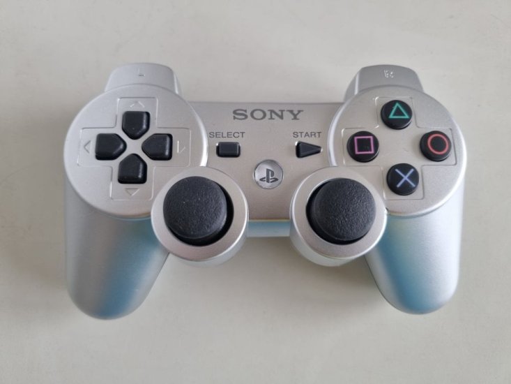 (Bild für) PS3 Wireless Controller Dualshock 3 - Silber - zum Schließen ins Bild klicken
