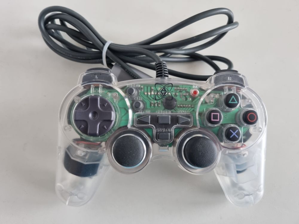 (Bild für) PS1 Controller Atomix - Transparent - zum Schließen ins Bild klicken